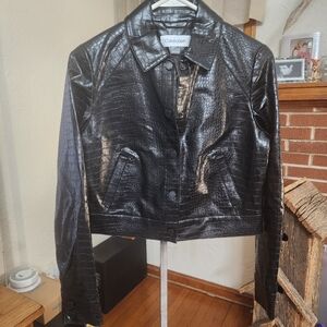 Calvin Klein Faux Leather Trucker Jacket.